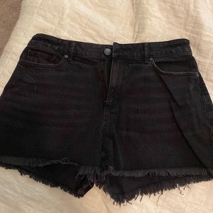 Distressed black denim shorts